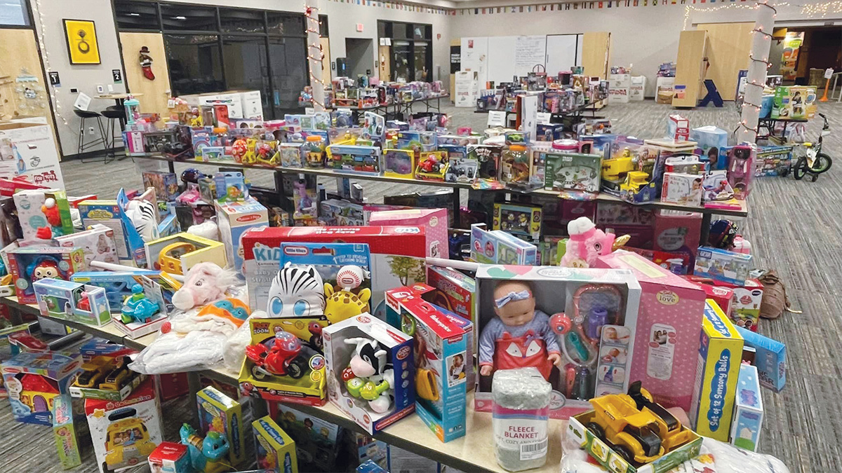 Toys sorted by age on tables